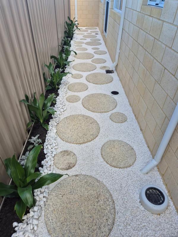 Assorted Round pavers and Glued down stones